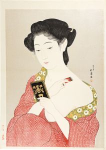 化粧の女